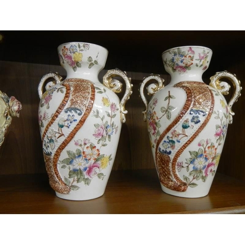 821 - Two pairs of early 20th century vases.