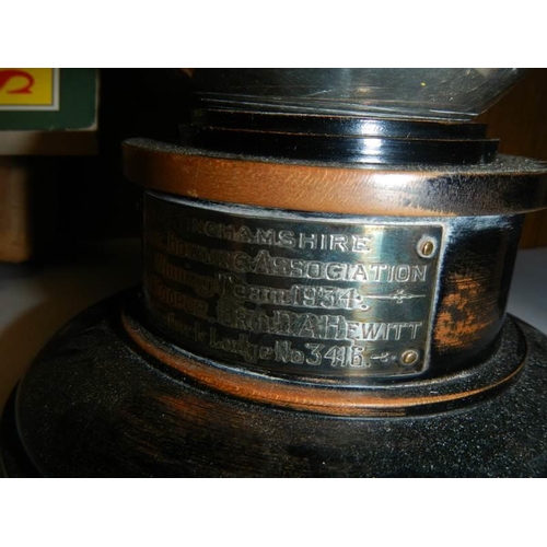 824 - A rare bowling trophy in  the shape of a ball on stand, 1934.