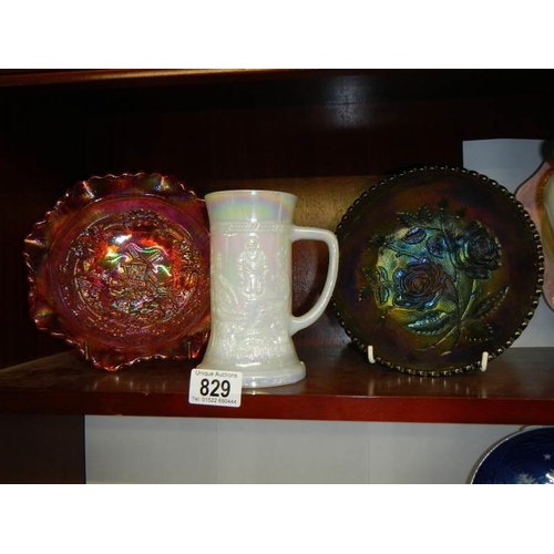 829 - Two carnival glass dishes and a white glass tankard.