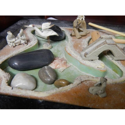 833 - A mid 20th century miniature hand made Japanese garden. COLLECT ONLY.