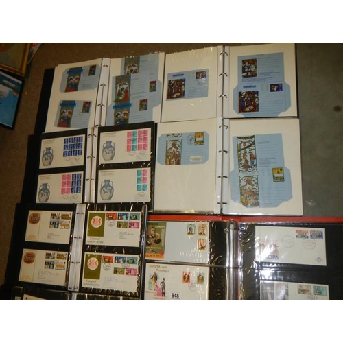 848 - Nine albums of first day covers etc.,