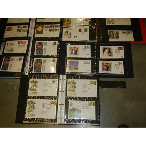 848 - Nine albums of first day covers etc.,