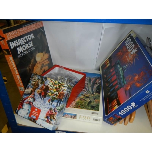 862 - A quantity of jigsaw puzzles.