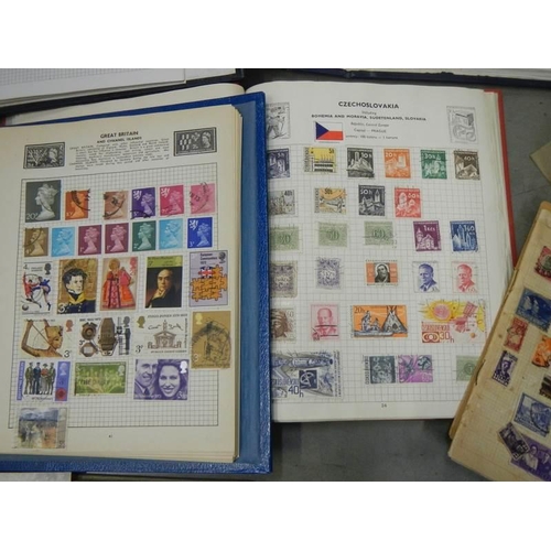 864 - A quantity of stamp albums with stamps.