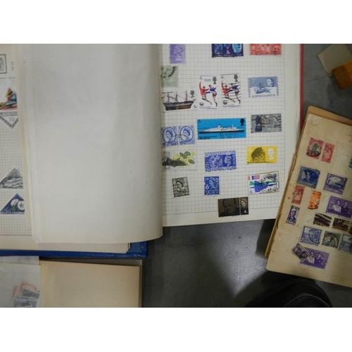 864 - A quantity of stamp albums with stamps.