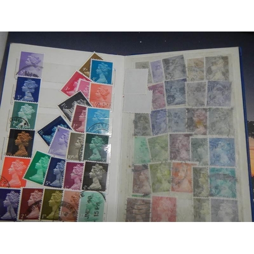 864 - A quantity of stamp albums with stamps.