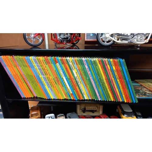 153 - A good lot of 60+ Ladybird books