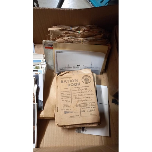 180 - A quantity of 1940's ephemera including postcards, letters, gas masks etc