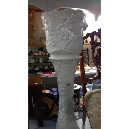 200 - A white glazed Jardiniere on stand height 85cm