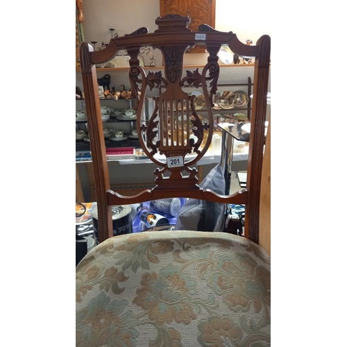 201 - An Edwardian mahogany lyre back nursing  chair