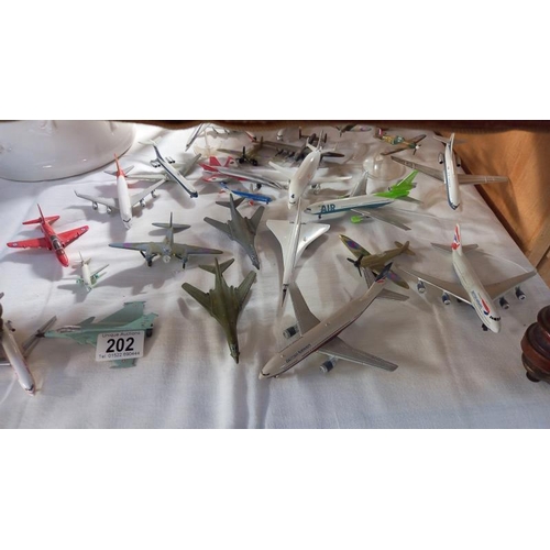 202 - A good quantity of diecast model aircraft