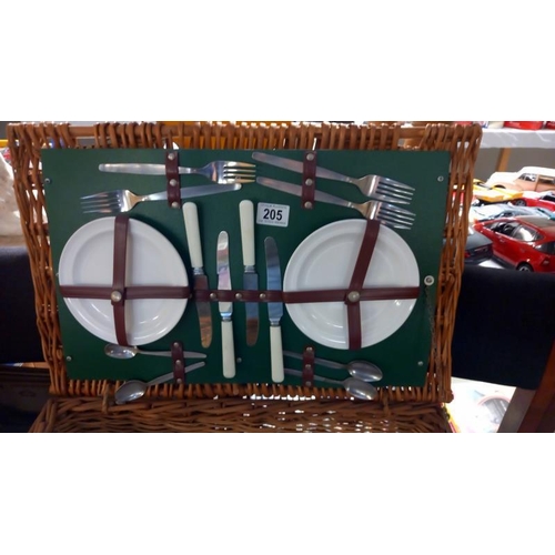 205 - A vintage wicker picnic hamper