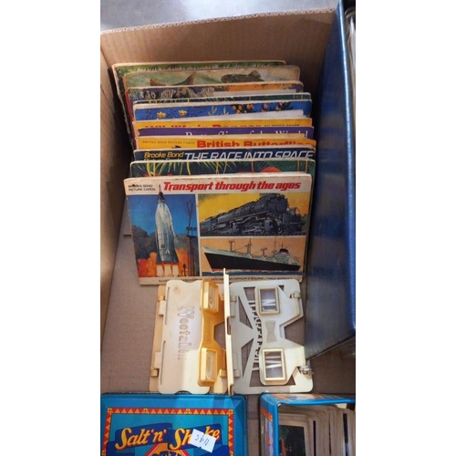 206 - An album of tea and cigarette cards, quantity of tea card books and contents and a Weetabix stereo v... 