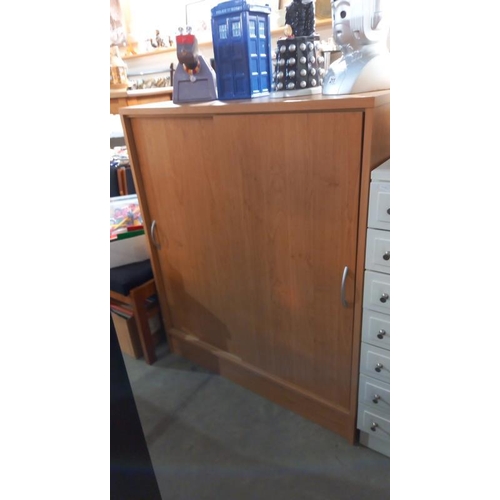 212 - A pine effect office cupboard 94cm x 40cm x 104cm