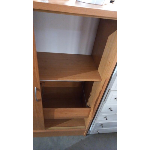 212 - A pine effect office cupboard 94cm x 40cm x 104cm