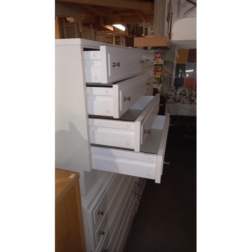 213 - A pair of STAG white bedroom chest of drawers, 82cm x 42cm x 97cm high and a pair of STAG white 4 dr... 