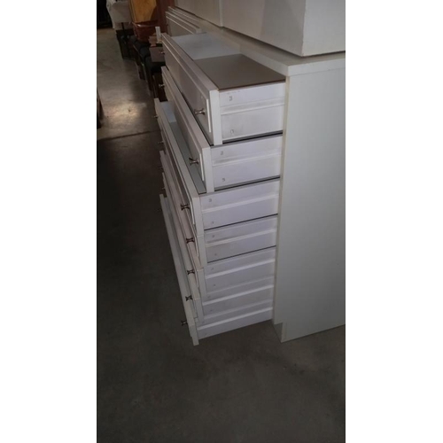 213 - A pair of STAG white bedroom chest of drawers, 82cm x 42cm x 97cm high and a pair of STAG white 4 dr... 