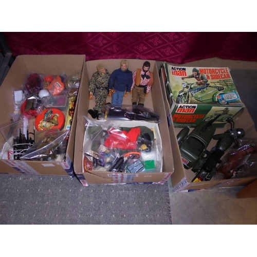 Three 1970's Action Man figures with a good selection of clothes and