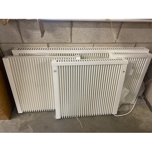 233 - 4 as new boxed oil filled radiators, 2 x 69cm x 64cm, 45cm x 64cm, 133cm x 64cm all sizes are approx... 