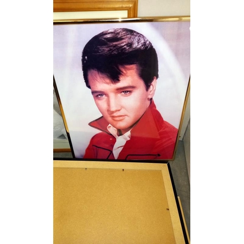 100A - A collection of Elvis Presley drawings, prints, clocks, montages & framed & glazed records etc.