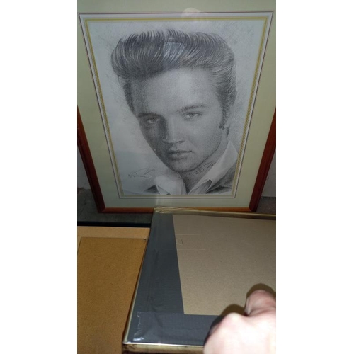 100A - A collection of Elvis Presley drawings, prints, clocks, montages & framed & glazed records etc.