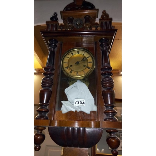 130A - A wall clock with pendulum