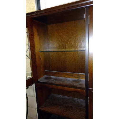 348 - A dark oak wall unit with leaded glass doors, COLLECT ONLY