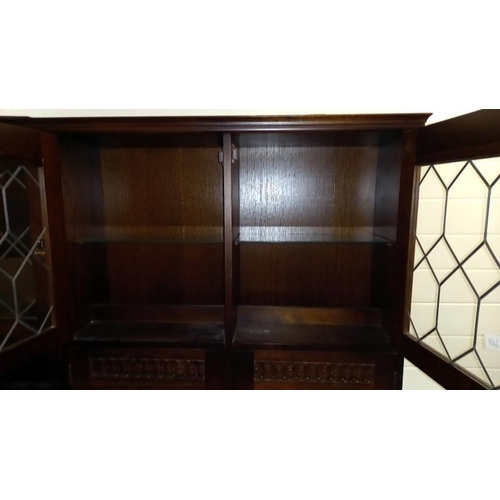 348 - A dark oak wall unit with leaded glass doors, COLLECT ONLY