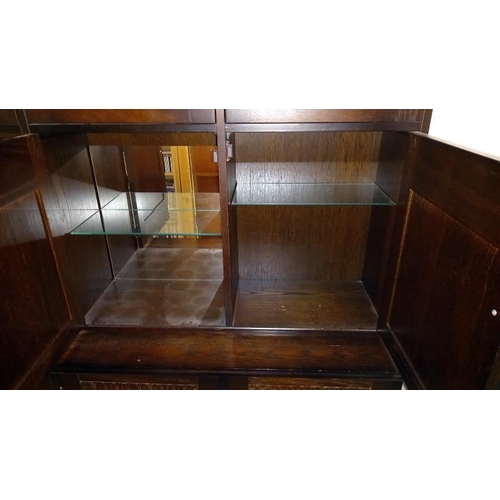 348 - A dark oak wall unit with leaded glass doors, COLLECT ONLY