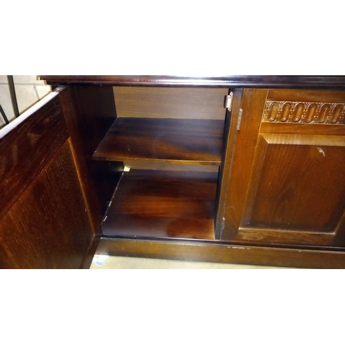 348 - A dark oak wall unit with leaded glass doors, COLLECT ONLY