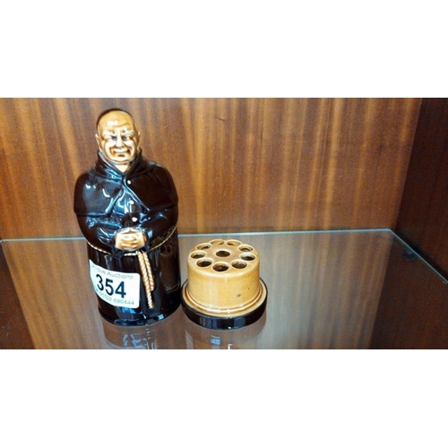 354 - A 19th/20th century pottery cigarette holder in form of a Monk height 14.25cm
