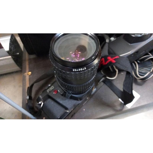 366 - A Pentax P30 camera with bag and a Riva Zoom 90C camera