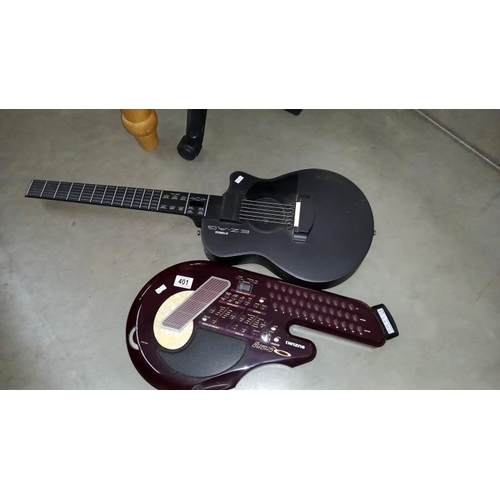 A Yamaha EZ-AG and a Suzuki QC1 digital guitars, COLLECT ONLY
