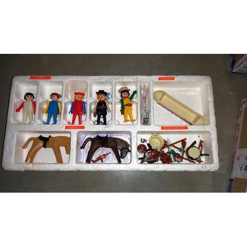 188 - A box of Britain's cowboys and Indians, zoo animals, play people, jigsaw etc