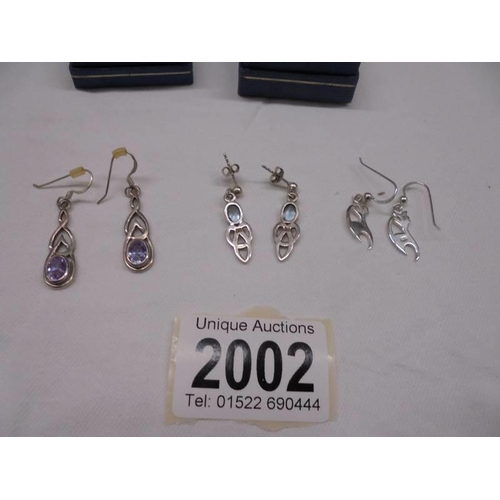 2002 - Five pairs of silver earrings.