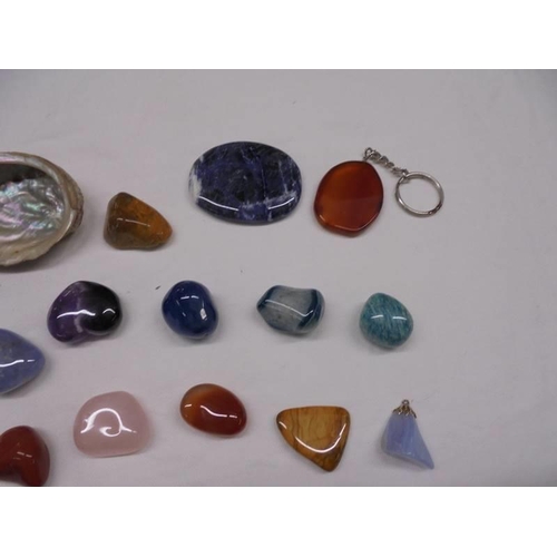 2004 - A mixed lot of polished and un-polished coloured stones.