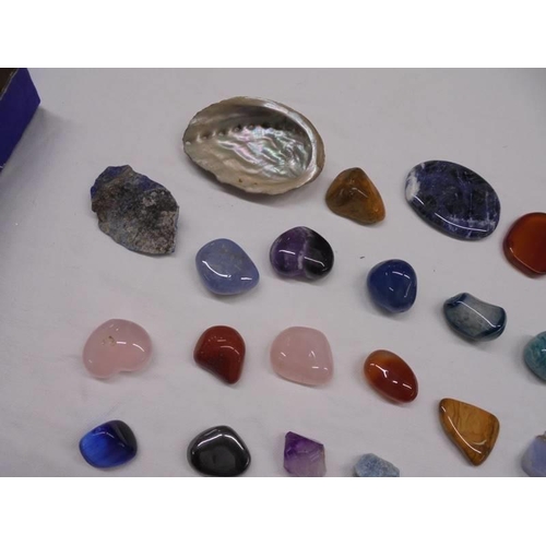 2004 - A mixed lot of polished and un-polished coloured stones.