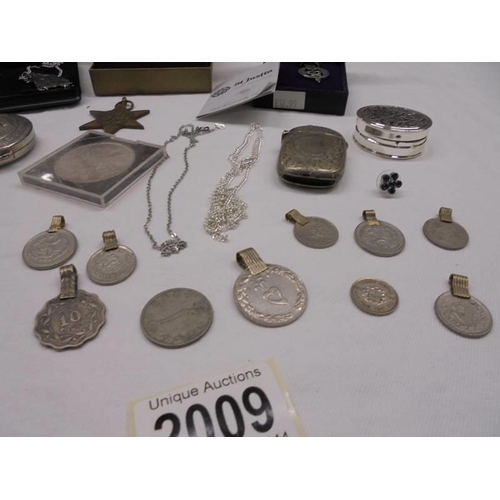 2009 - Two Celtic necklaces, a maple leaf brooch and a quantity of coins made in to pendants,