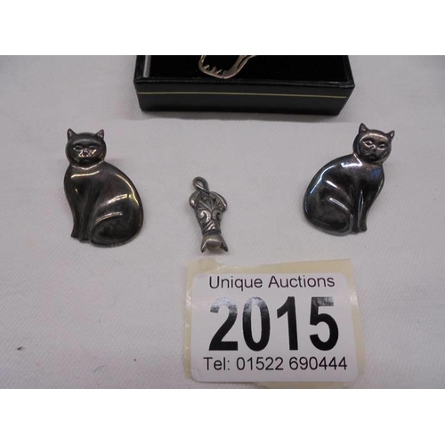 2015 - A silver cat pendant with matching earrings, another silver cat pendant and a pair of silver cat ear... 