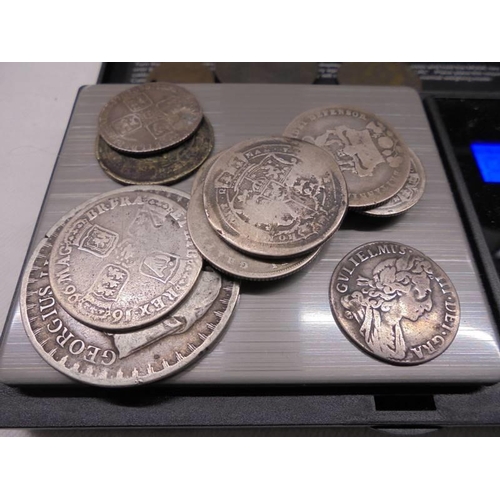 2039 - A quantity of George II/III/IV silver coins (64 grams) and three other George III coins.