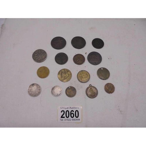 2060 - A mixed lot of early coins and tokens including Victoria, George III etc.,