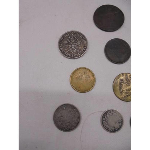 2060 - A mixed lot of early coins and tokens including Victoria, George III etc.,