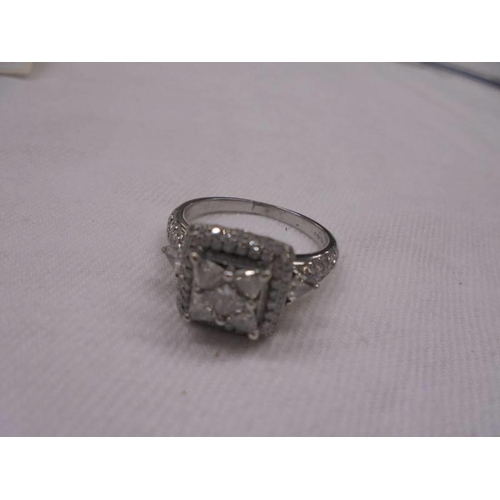 2063 - A fine 14 carat gold and diamond ring, size R, 5.5 grams total.