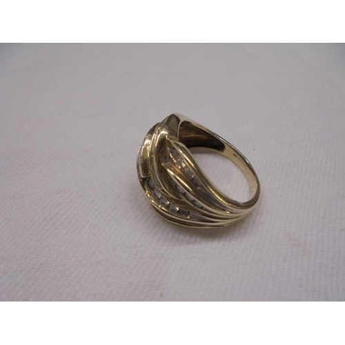 2064 - A 9ct gold ring set baguette diamonds, size P, 6 grams total.