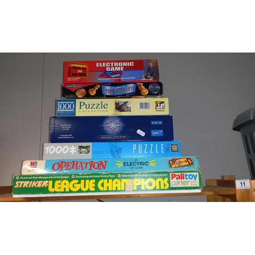 11 - A Selection of Vintage games Including Operation & Striker League Champions