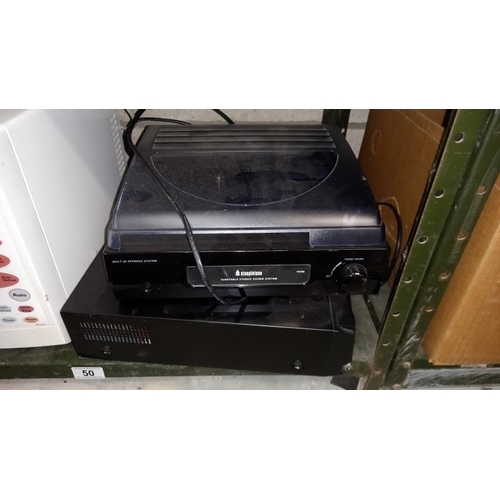 50 - A Panasonic DMR-EZ49V VHS DVD Player and a Steepletone Record Player and a Sanyo Microwave.