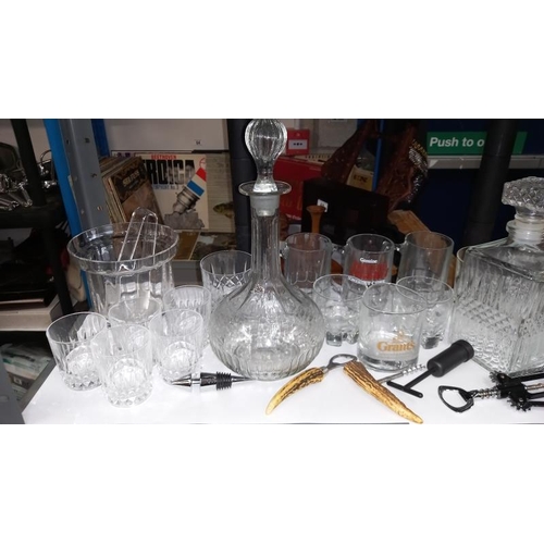 55 - A Set of Drinking Glasses and 2 Decanters