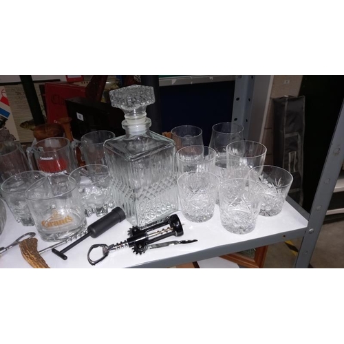 55 - A Set of Drinking Glasses and 2 Decanters