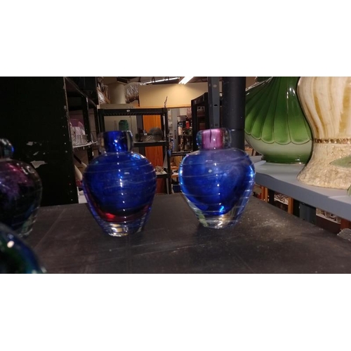 59 - A Selection of 7 Coloured Art Glass Bud Vases