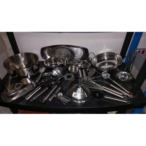 67 - A Quantity of stainless steel cooking utensils